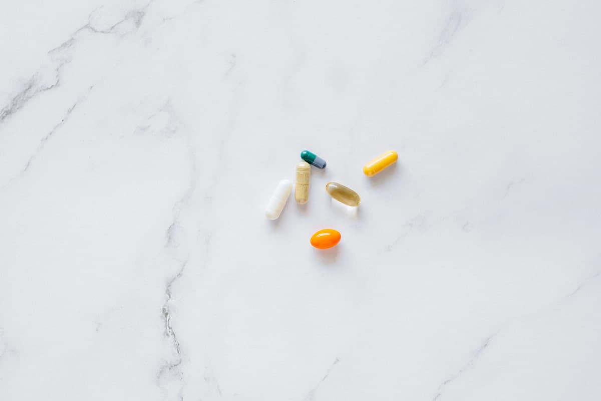 Glow Protocol supplement products arranged on a clean surface with natural lighting