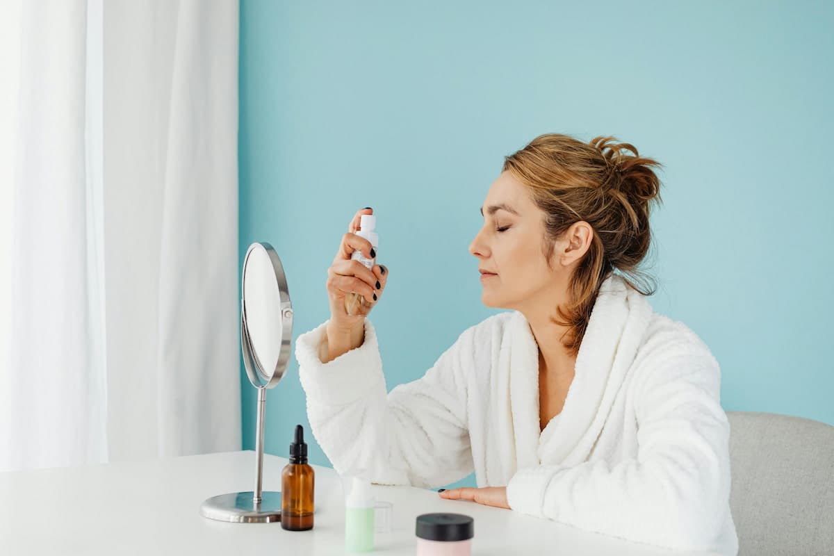 Person with healthy, radiant skin maintaining a consistent nutritional skincare routine