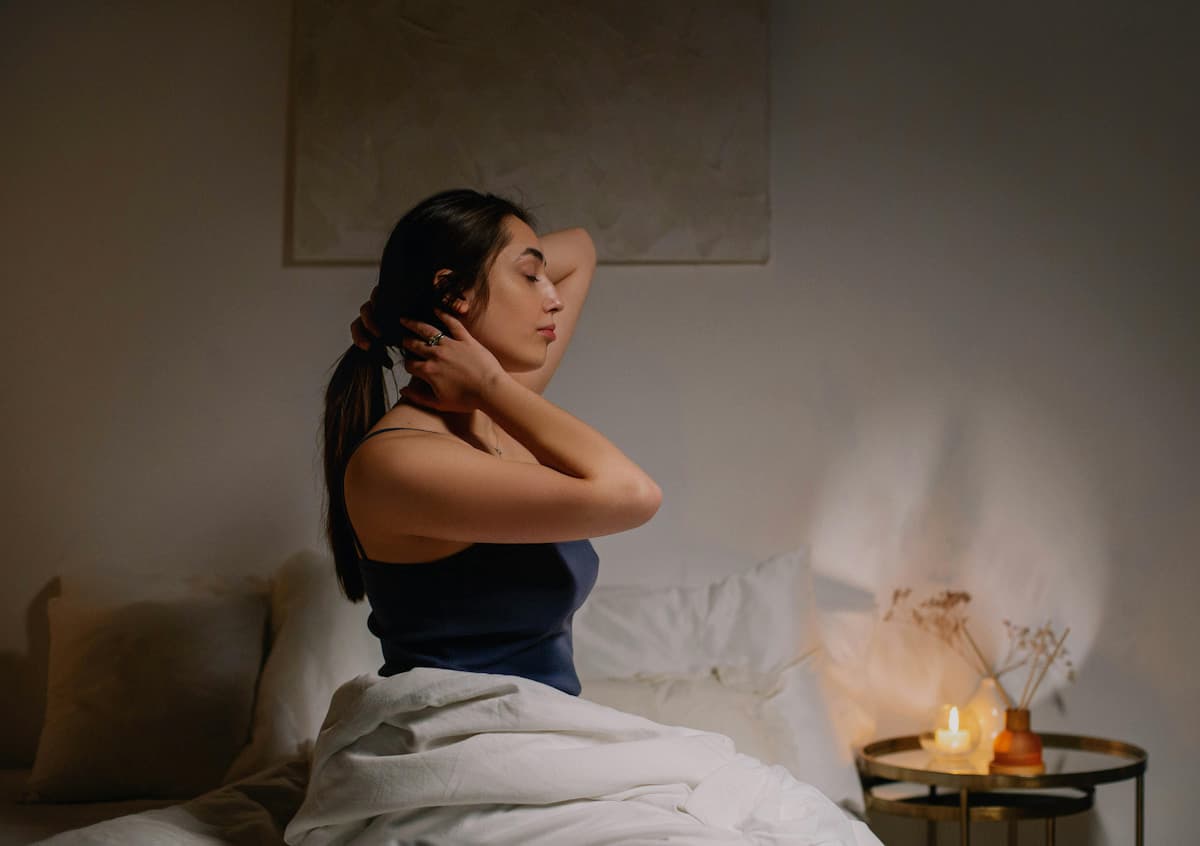 Active person winding down for sleep, representing physical recovery through overnight rest