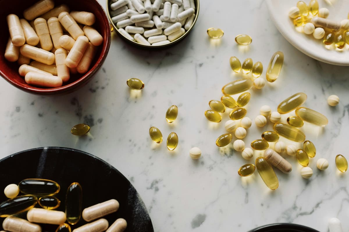 Advanced B Complex, LipoCap™ Iron, and Vitamin D3 1000IU arranged together for preconception nutrition